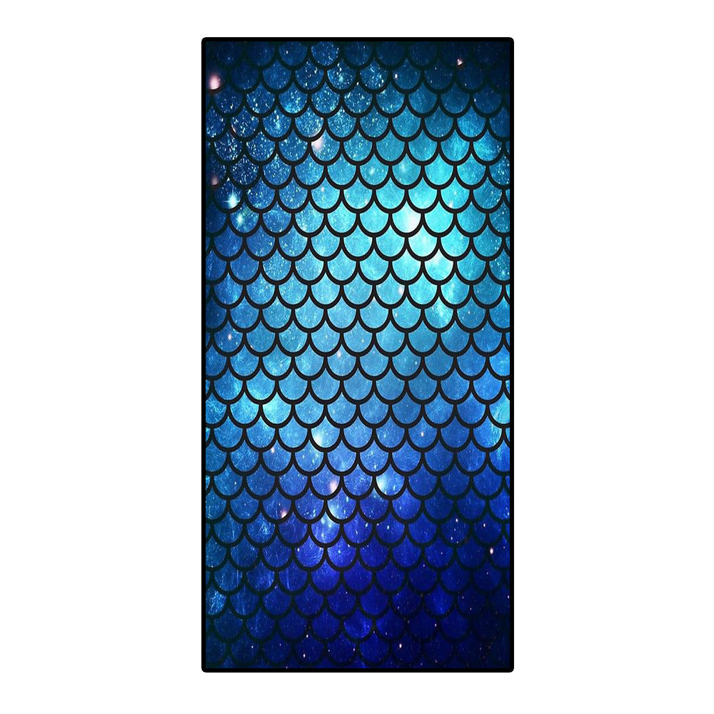 Microfiber bath towel with 3D mermaid scale design in blue tones.
