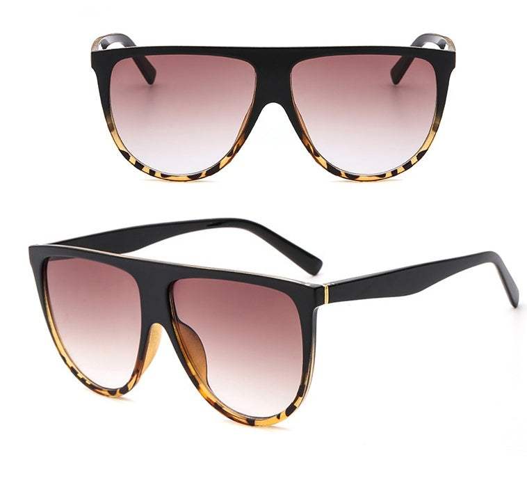 Sunglasses for women with gradient lenses and full frame, featuring UV protection.