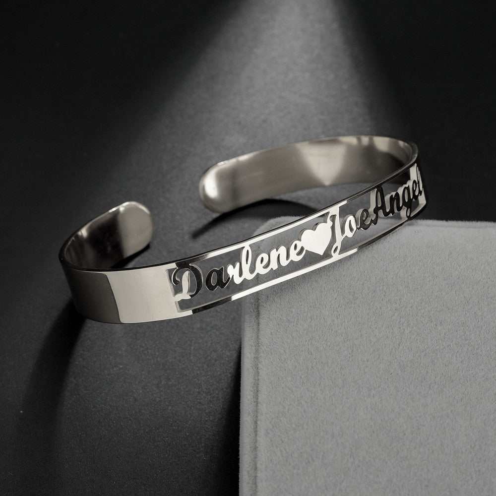 Customized name bracelet in stainless steel, featuring engraved personalized design, perfect for special occasions.