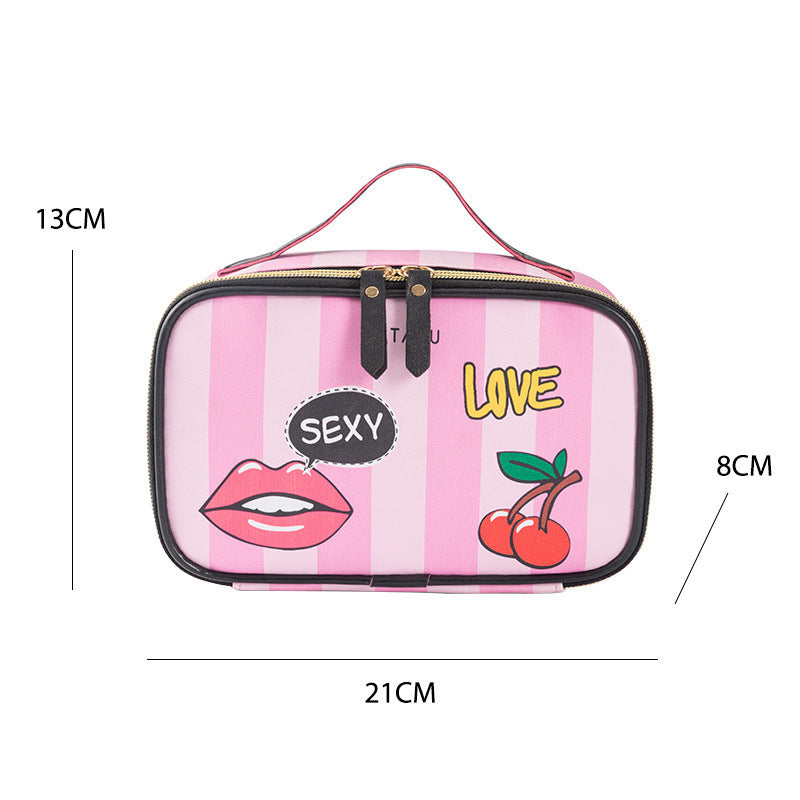 Small portable toiletry bag with pink stripes, cherry and lip print, zipper closure.