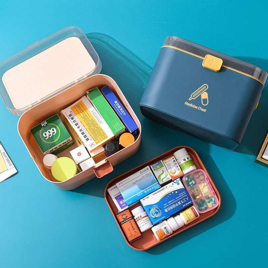 Nordic blue and pink portable double-layer medicine box with compartments, ideal for organizing first aid supplies.