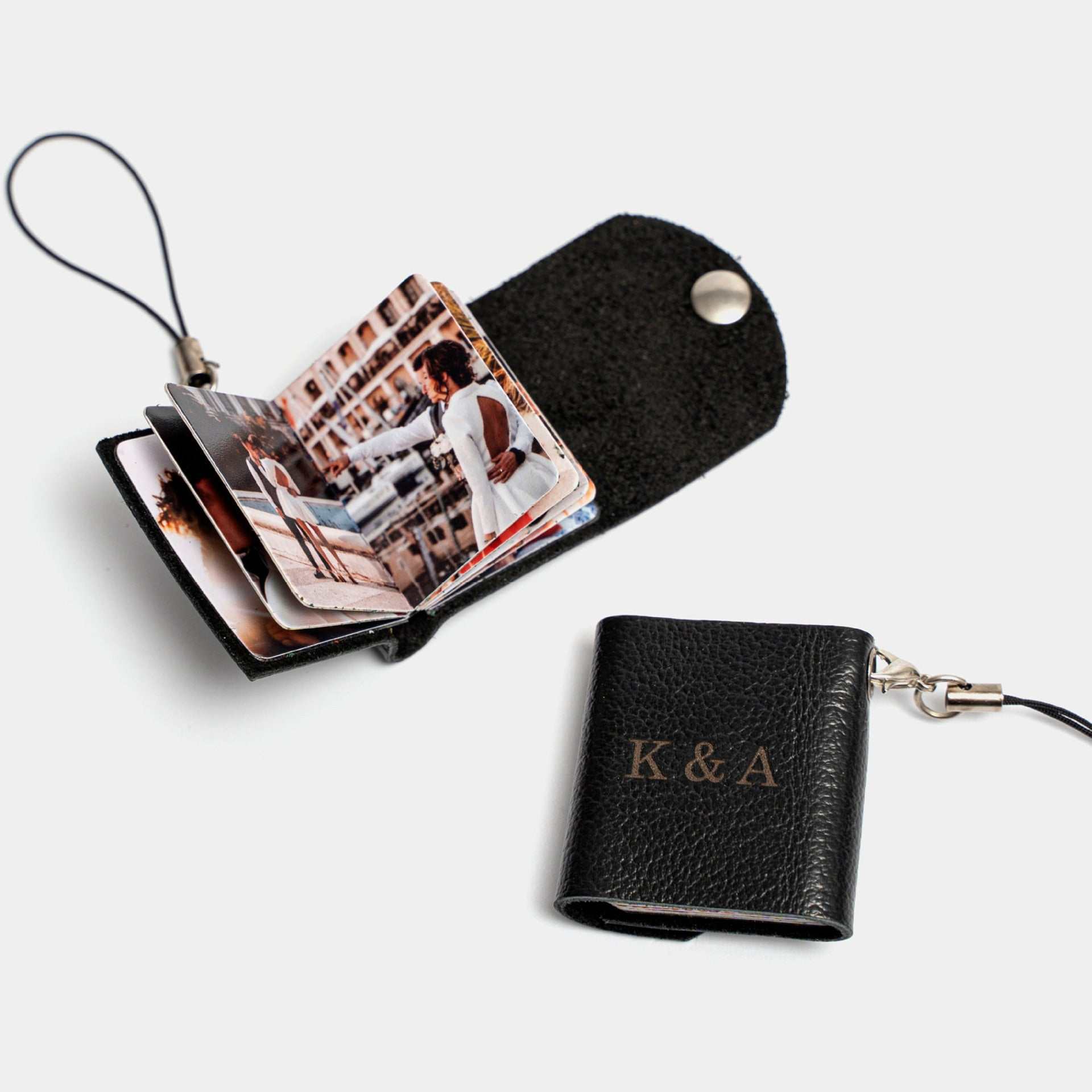 Mini leather photo keychain with personalized DIY feature, showcasing a foldable design with multiple photo slots in black color.