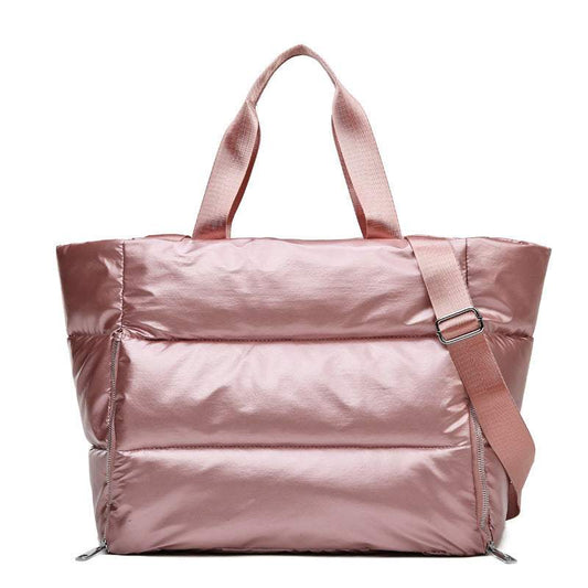 Women's gym bag in durable pink nylon fabric with a cross-body strap.