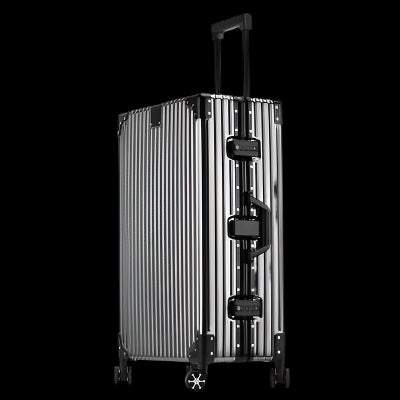 Aluminum magnesium alloy luggage with universal wheels, sleek silver finish, large size.