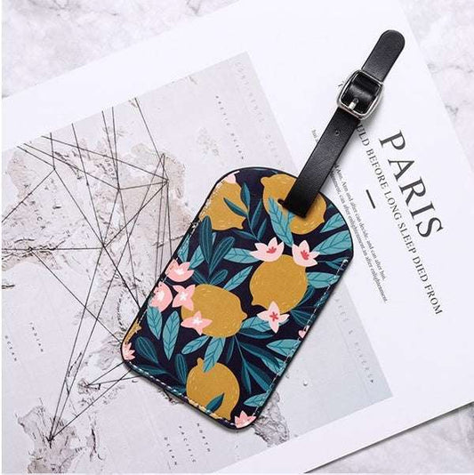 Colorful personalized travel luggage tag with cartoon design and adjustable buckle.