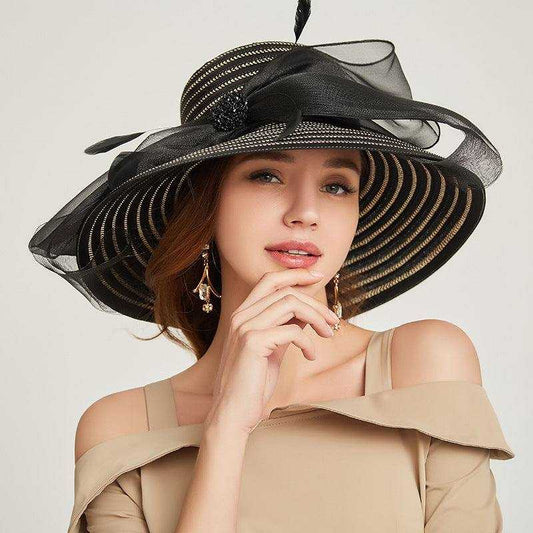 Big brim ladies sunshade hat with bows, made from papyrus and polyester fiber, featuring European and American style.