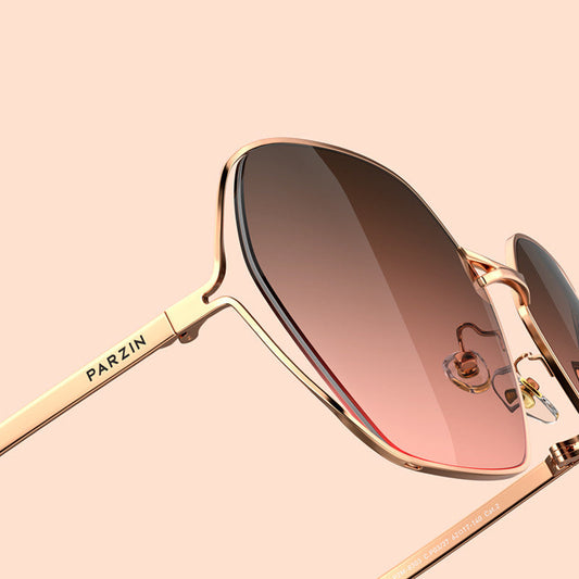 Women's fashion gradient shades with nylon lenses and metal frame.