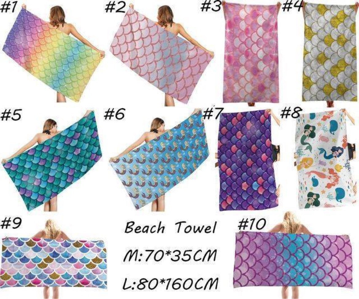 Colorful microfiber bath towels with mermaid and scales design.